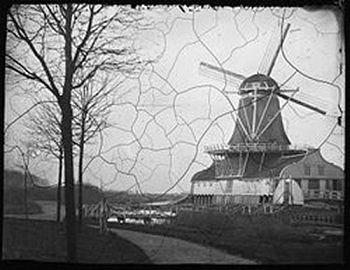 1, Molen 06491 g Het Klaverblad (Amsterdam), Foto van Jacob Olie Jbz., J. (1834-1905, opname 1865 de molen in de rouwstand | Database Nederlandse molens media-bestand