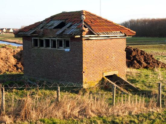 1, Molen 03174 Zuricherpolder (Zurich/ Surch), Het vijzelgemaal dat de molen verving. Foto MHO, 9 dec. 2015 | Database Nederlandse molens media-bestand